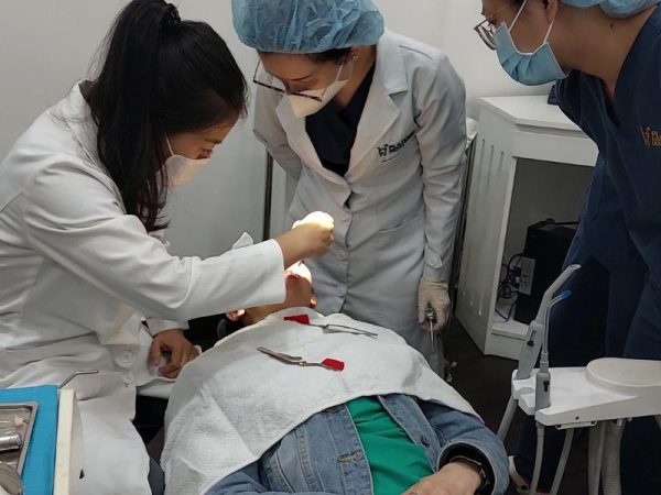 Proper home cleaning and protection of newly restored teeth